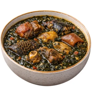 Experience the authentic taste of Ofe Onugbu. Our Bitterleaf Soup is rich, savory, and made with traditional ingredients like cocoyam and assorted meats. Order now!