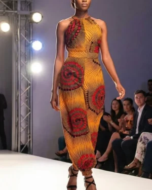 Radiant Sunburst Halter Neck Jumpsuit – Vibrant Yellow and Red Spiral Print